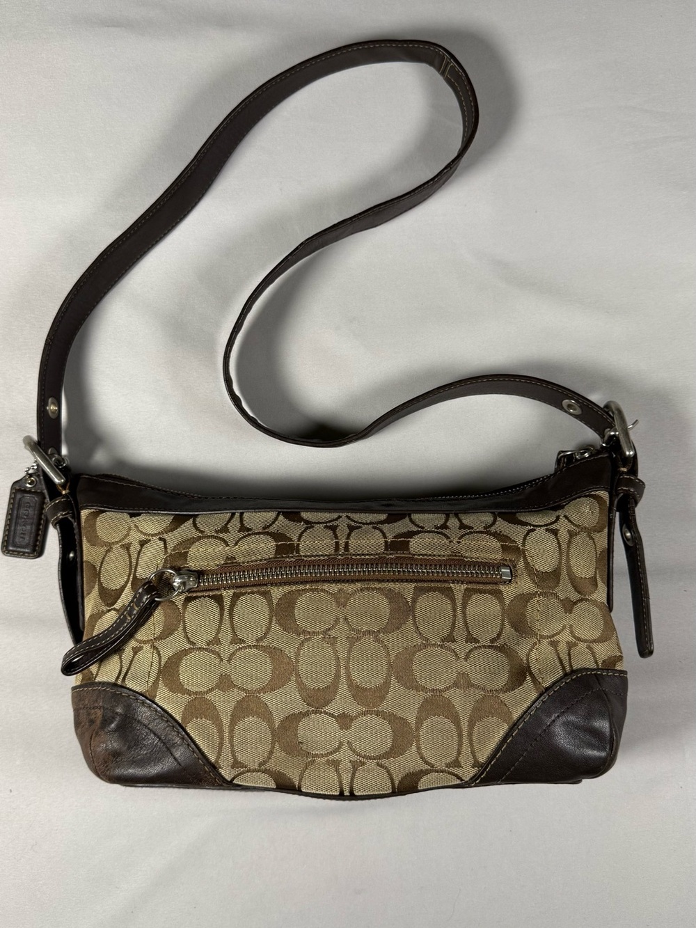 vintage Y2K-era signature canvas and leather hobo/shoulder bag